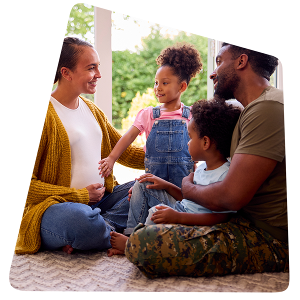 shape-ArmyFamilyonFloorTogether_PregnantMom